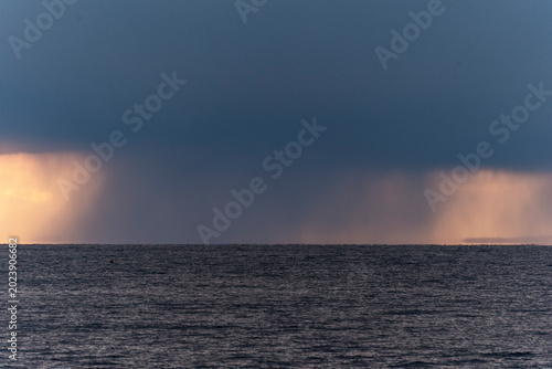 Photos Dramatic landscape of a heavy thunderstorm and rain shower pouring down on the h