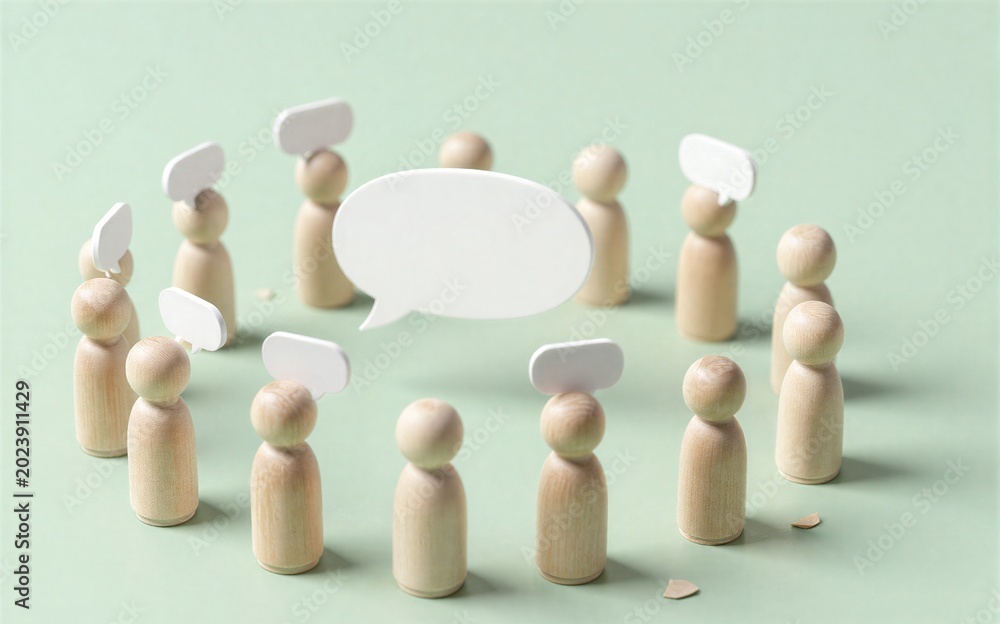 Obraz premium Wooden figures surround large speech bubble symbolizing group