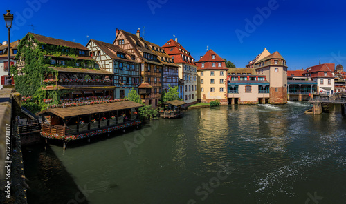 Photos Half timbered houses with flowers, canals of Petite France in Strasbourg, France
