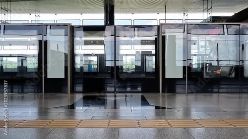 Station with platform screen doors