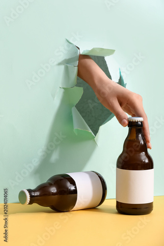 Bottles of cold beer and fe...