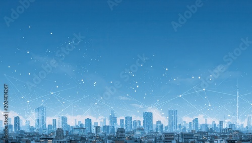 Illuminated cityscape at night with glowing lights and connected network patterns against a deep blue sky background symbolizing technology and urban development