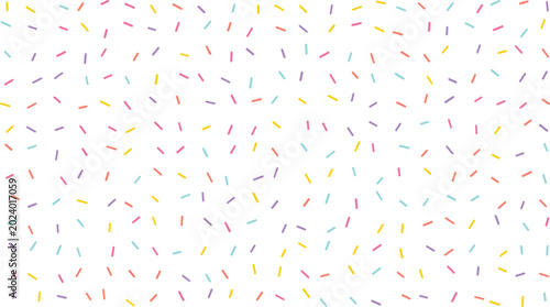 Obraz na plátně A whimsical arrangement of yellow purple pink and light blue sprinkle dashes cov