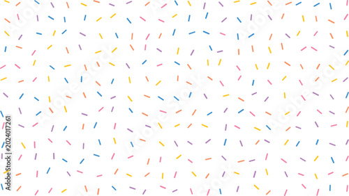 Delightful colorful sprinkles scattered randomly across a clean white background creating a cheerful repeating pattern