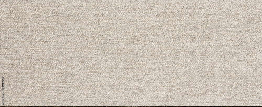 Fototapeta premium A close-up view of a textured beige carpet surface