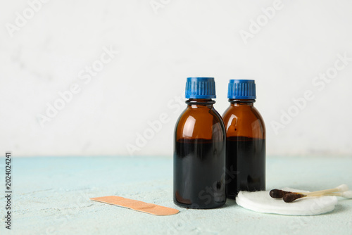 Bottles with iodine, cotton...