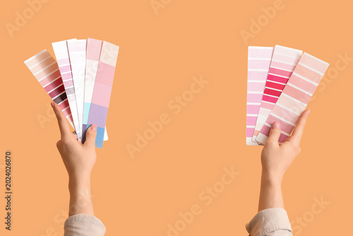 Female hands with pink colo...