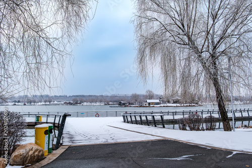 Snow Scenery of Hailong Lake Scenic Area in Meihekou, Jilin Province, China – Urban Ecological Park and Lakeside Landscape Covered in Late Spring Snow – April 4, 2026