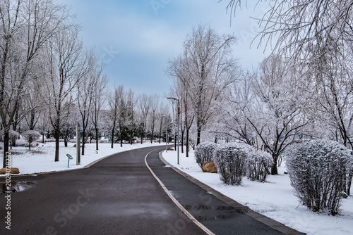 Snow Scenery of Hailong Lake Scenic Area in Meihekou, Jilin Province, China – Urban Ecological Park and Lakeside Landscape Covered in Late Spring Snow – April 4, 2026
