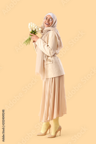 Young Muslim woman in styli...