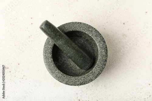 Mortar and pestle on light ...