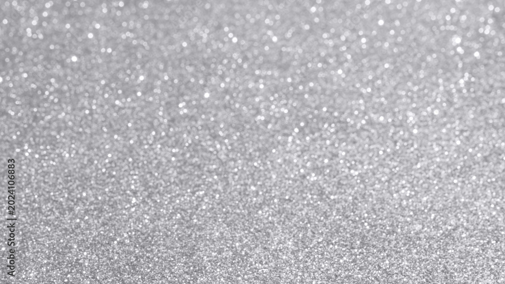 Fototapeta premium Abstract silver glitter sparkle texture with bokeh background