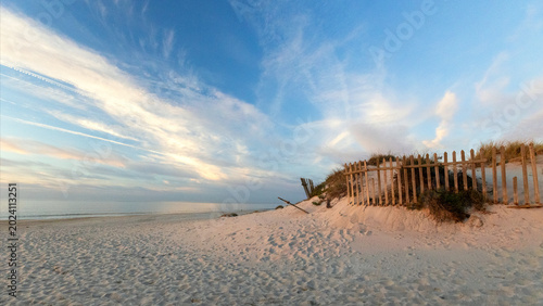 Slika na platnu Scenic sand dunes with wooden fence on the Praia de Mira Miravella Beach Dunes a