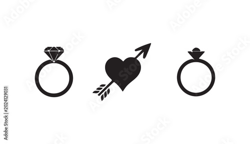 Canvastavla Two black silhouette wedding rings with diamond and heart pierced by arrow vector illustration