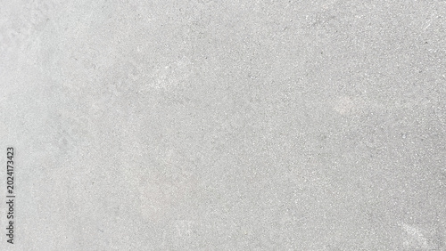 Light gray asphalt surface with fine grain and smooth even texture. A clean, uniform finish with minimal variation across the frame. Ideal for road, urban, or neutral design backgrounds.