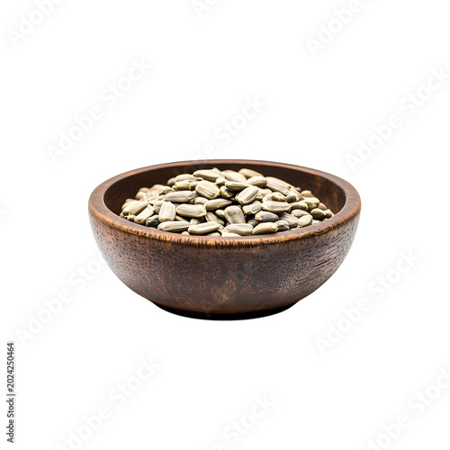 Roasted sunflower seeds in wooden bowl on transparent background