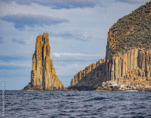 Stunning sight of Cathedral Rock and Cape Pillar, Tasman National Park, Tasman Peninsula, Tasmania, Australia