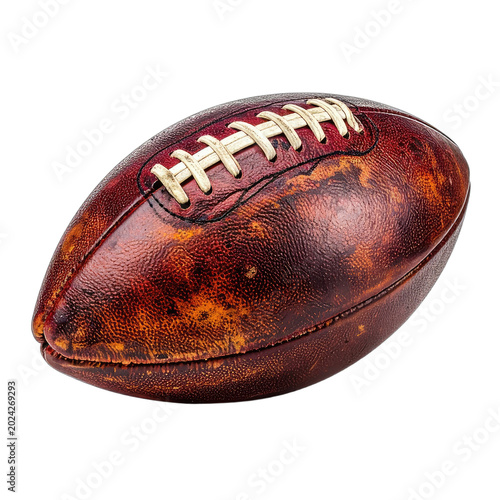 A vintage American football rests on a black background, showcasing its aged leather and stitched laces.