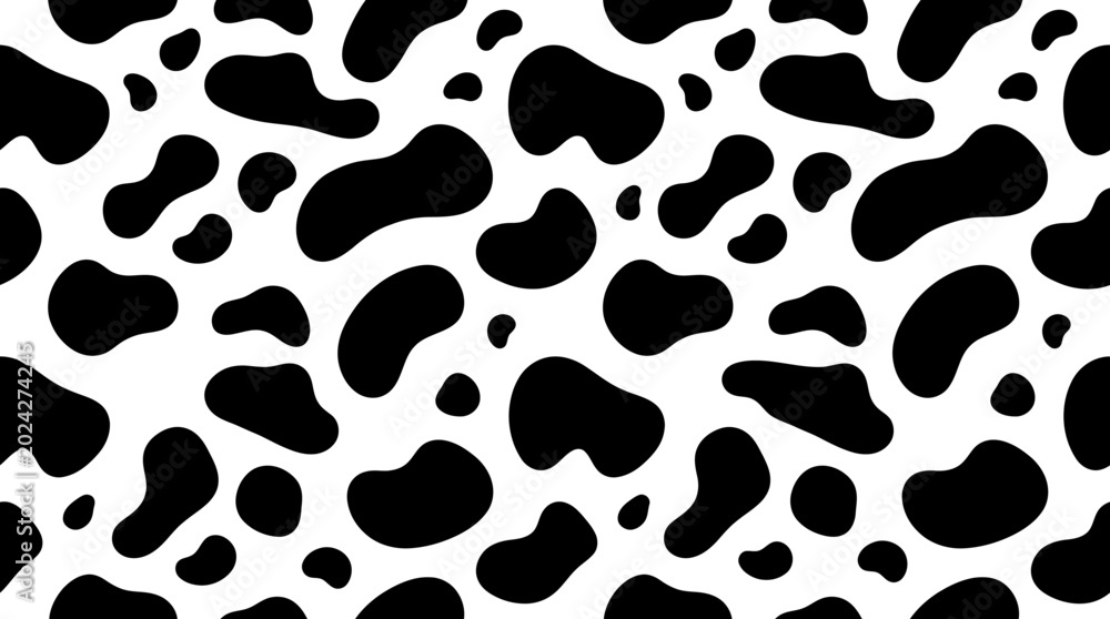 Fototapeta premium Black and white cow spots pattern.