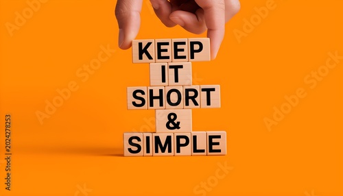 Keep It Short and Simple Concept - Wooden Blocks in Handkeep it short and simple
