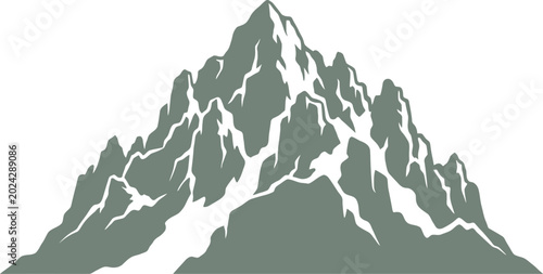 Vertical cliff face and sharp needle-like peaks of a high mountain