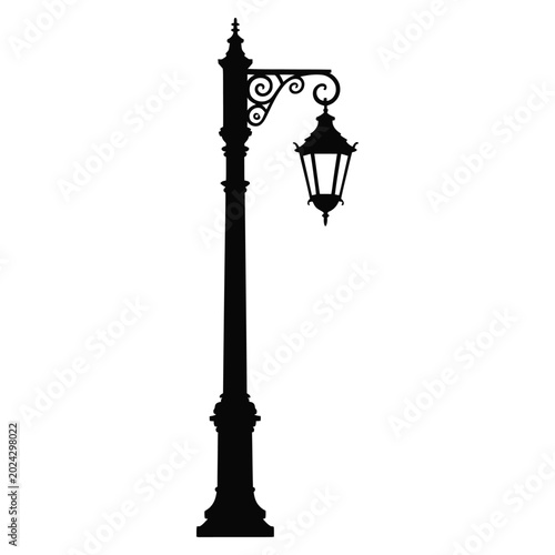 Vintage street lamp with ornate details in a black silhouette