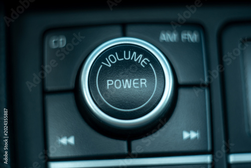 Fotografía Close up of car audio system control panel with volume and power button