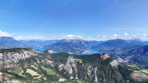 Bilde på lerret Panoramic view of Lac Serre-Poncon lake surrounded by mountains and valleys, Hautes-Alpes, France, Europe