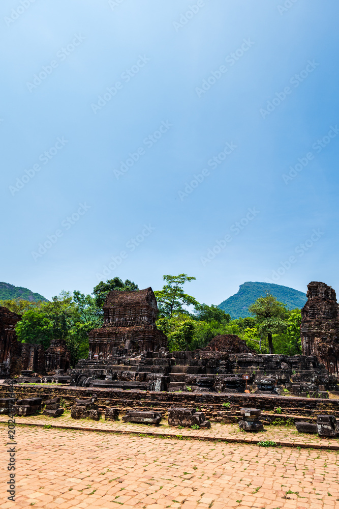 Fototapeta premium My Son sanctuary archaeological site near Da Nang, Vietnam. Ancient Cham Kingdom hindu temple ruins