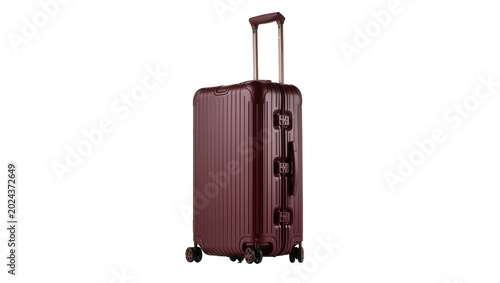 Foto Maroon ribbed hard-shell suitcase with telescopic handle, isolated on transparen
