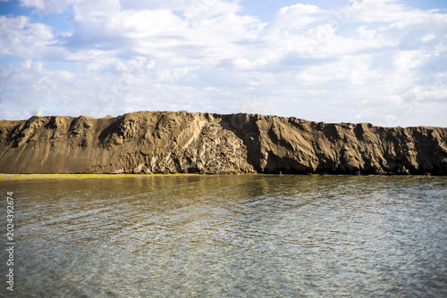 the section of a river where it flows into the sea