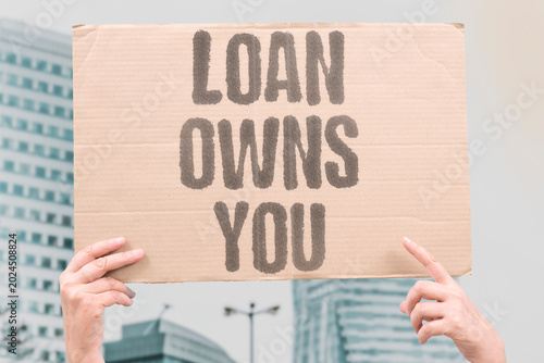 Εκτύπωση καμβά "Loan Owns You" High-interest borrowing creates financial captivity far beyond the original value