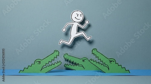 Paper stick figure leaps confidently over three green paper crocodiles in blue water. Conveys overcoming danger, risk management, and bravery.
