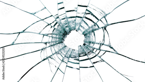 фотографія Isolated abstract shattered glass with a central impact hole and numerous radiat