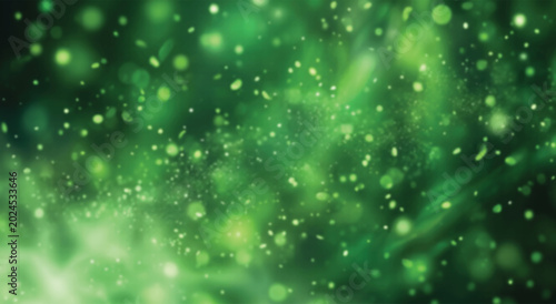 Green bokeh lights and particles, abstract blurred background