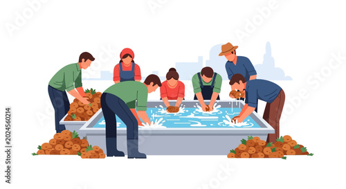 Photos Group of farmers washing freshly harvested carrots in a large water trough