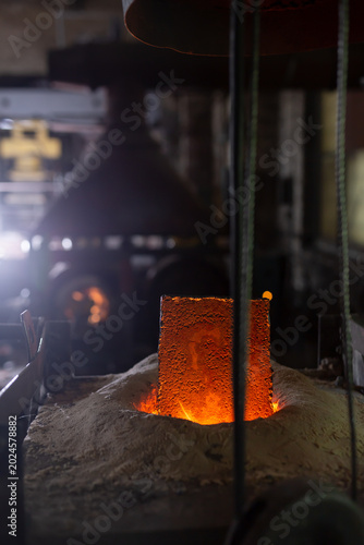 Canvastavla Ferrous metal billet is melted in an induction furnace closeup
