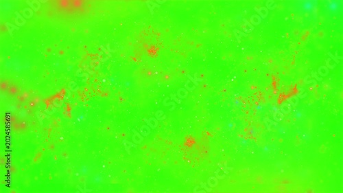 Vibrant green background with scattered orange specks and texture