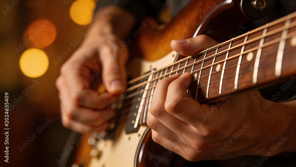 Obraz premium Hands playing electric guitar