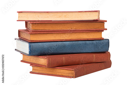 Stack of vintage books isolated on white background with clipping path