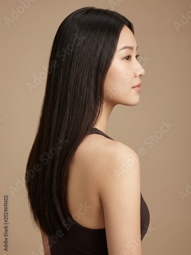 Young asian woman with long black hair portrait