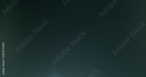 Slow motion cinematic lens flare and light leak effect isolated on black background. Perfect overlay for VFX, transitions, title reveals, film burn style and glow highlights.