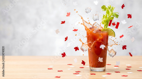 Bloody mary cocktail with canadian flags and maple leaves at Canada Day