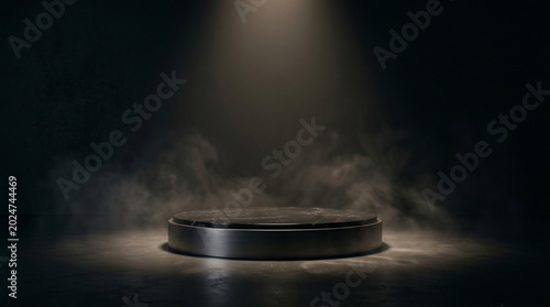 Dark stage with spotlight on round platform