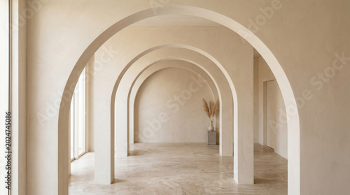 Modern interior with white arches and beige walls