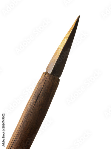 Photography Isolated antique primitive spearhead featuring rustic wooden shaft and sharp age