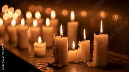 Flickering Candles in Glass Jars with Rising Smoke at Night