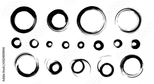 Obraz na plátně Abstract hand-drawn ink circles and brush strokes set.