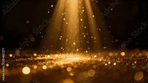 Golden light beams and sparkling dust