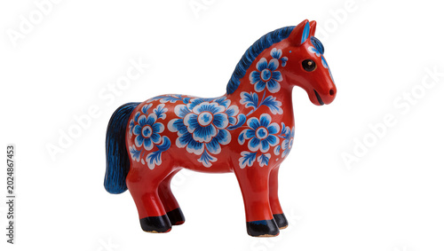Foto Isolated vibrant red Dala horse inspired figurine with blue and white floral folk art decoration